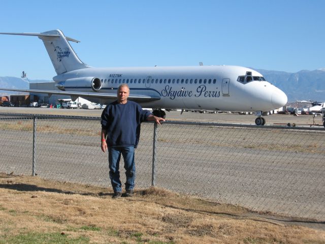 Douglas DC-9-10 (N127NK) - Just finished jumping out of the DC9!br /Standing against the fence while it is on another jump!