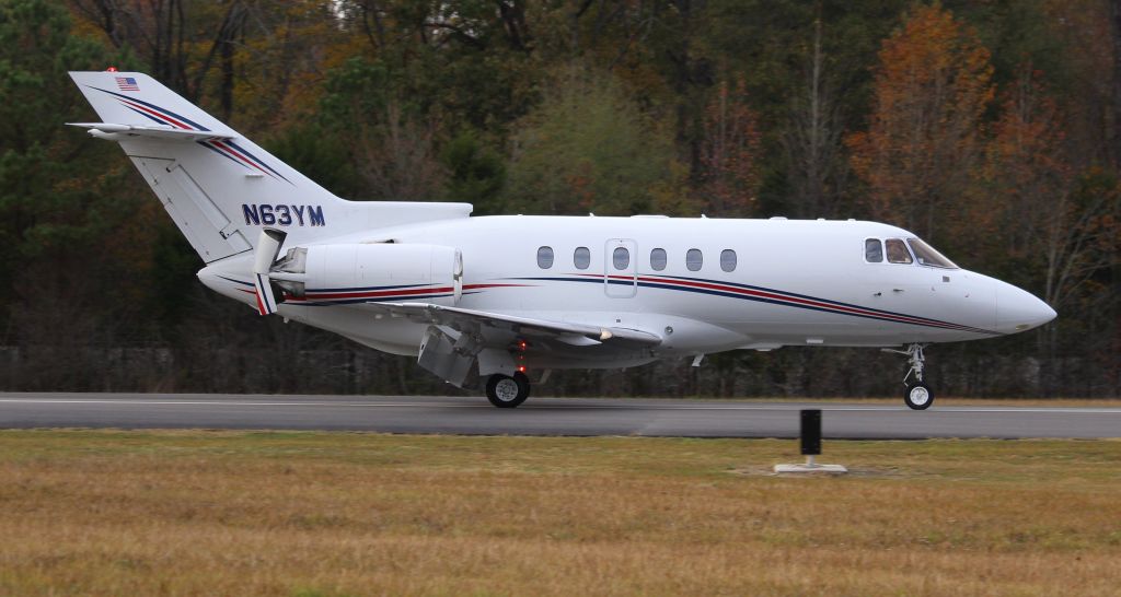 Hawker 800 (N63YM) - A Hawker 800XP on its landing roll at Word Field, Scottsboro Municipal Airport, AL - late afternoon, November 1, 2022.