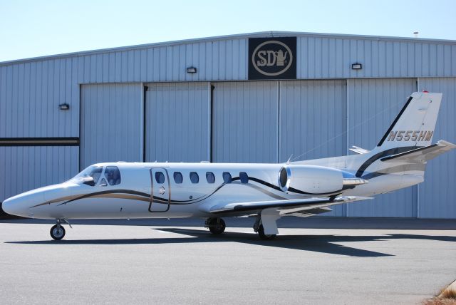 Cessna Citation II (N555HM) - S&D COFFEE INC in front of its hangar at KJQF - 2/23/09