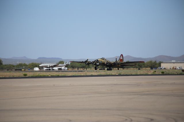 Boeing B-17 Flying Fortress (N93012) - Collings Foundation Boeing B-17G, Nine-O-Nine, on 18 April 2015.  Eisenhowers Constellation, VC-121A-LO, Columbine II, SN: 48-0610, is seen in the background.