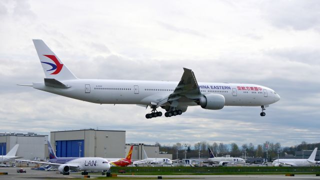 BOEING 777-300 (B-2020) - BOE455 on final to Rwy 16R to complete a flight test on 3/17/15. (ln 1285 / cn 43272). BOE225 #CC-BGB can be seen holding for Rwy 16R.