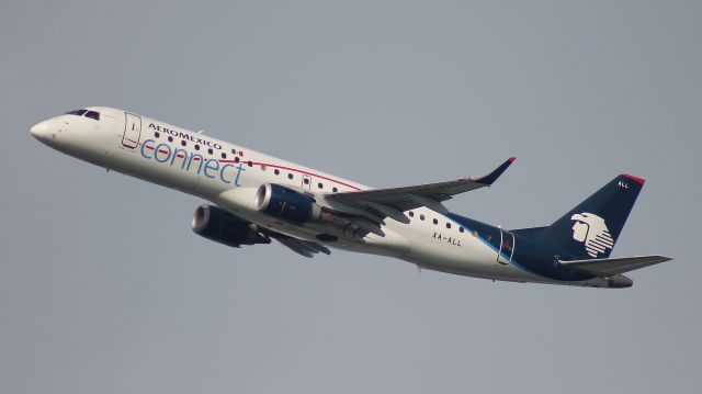 Embraer 170/175 (XA-ALL) - Departing runway 31L on 16 September 2017.