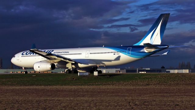 Airbus A330-300 (F-HSKY) - From "rue du berger". Imminent takeoff .In rolling taxiway W47.