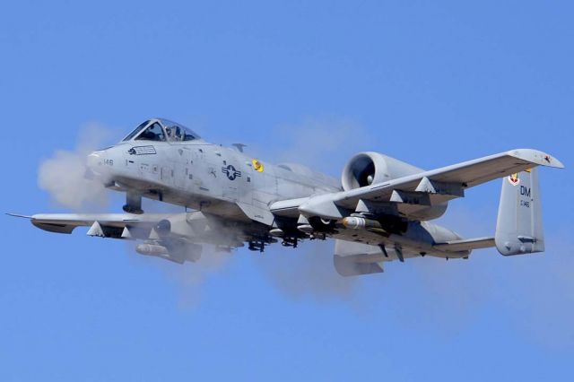 80-0146 — - Fairchild-Republic A-10A Thunderbolt II 80-0146 of the 357th Fighter Squadron Dragons fires its GAU-8 gatling cannon at the Goldwater Range, Arizona..