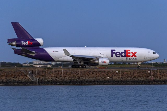 Boeing MD-11 (N616FE) - FedEx (N616FE) McDonnell Douglas MD-11F taxiing at Sydney Airport.