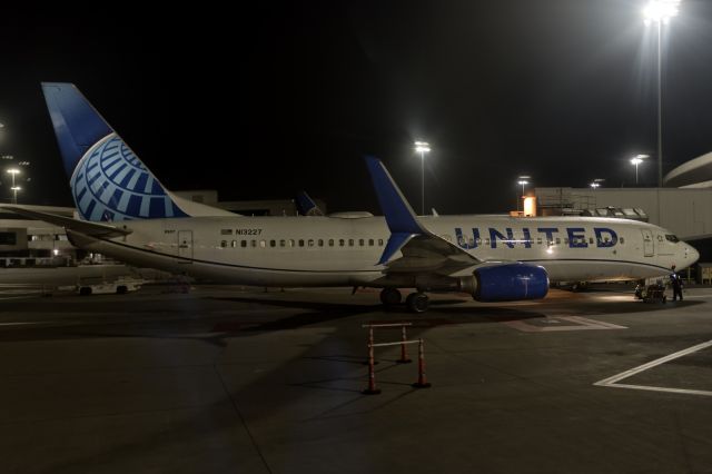 Boeing 737-800 (N13227) - 5th Oct., 2020: Parked on the ramp at a semi deserted San Francisco International Airport in the middle of global COVID-19 pandemic.