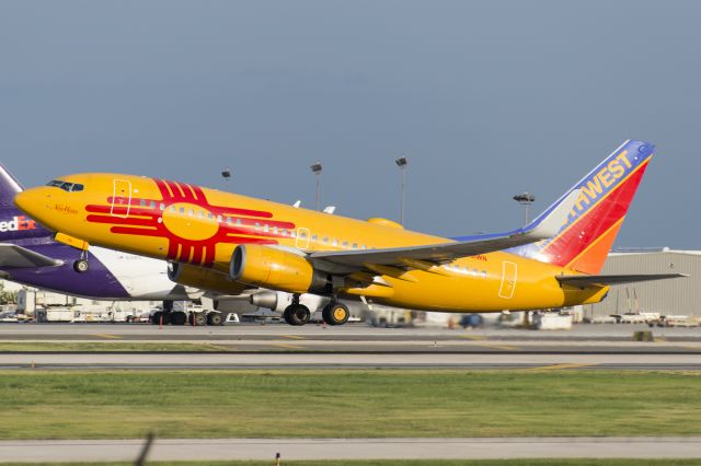 Boeing 737-700 (N781WN) - New Mexico One departing Runway 4.