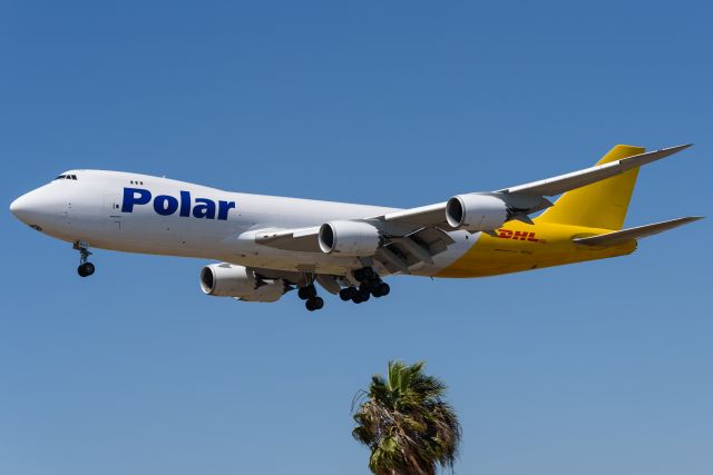 Boeing 747-200 (N855GT) - On final for 25L, taken from the Proud Bird deck