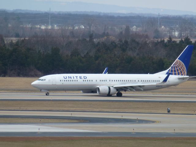 Boeing 737-900 (N38473) - @IAD Daily Parking Garage #2 5th floor