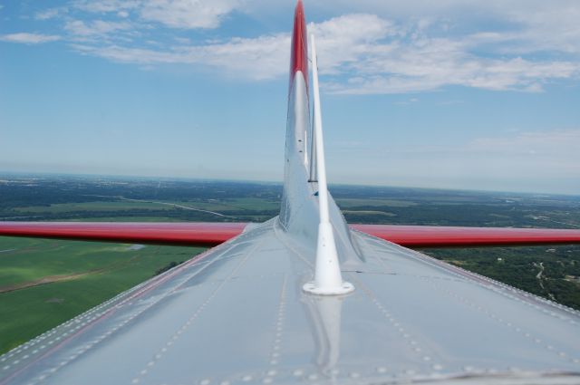 Boeing B-17 Flying Fortress (N5017N) - View of the tail of EAAs Aluminum Overcast - VFR at 2,000 feet, hatch open!