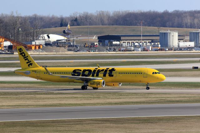 Airbus A321 (N661NK) - Took this nice crisp shot of the Spirit Airbus taxxing the runway. I like the color contrast and lighting in this one so I decided to upload it. 