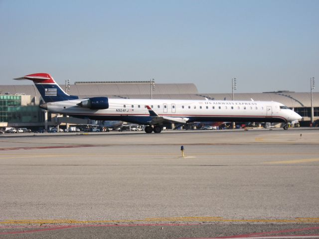 Canadair Regional Jet CRJ-900 (N924FJ) - Holding on RWY 19R
