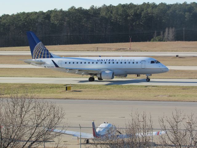 Embraer 170/175 (N652RW) - United Express (Republic Airlines) flight 3289 to Newark Liberty Intl, an Embraer 175 taxiing to takeoff on runway 23R. This was taken January 30, 2016 at 4:03 PM.