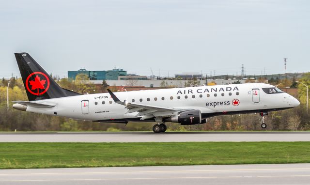 Embraer 175 (C-FRQN) - The first ACExpress Embraer in the new livery lifts her nose wheel off runway 33L at YYZ