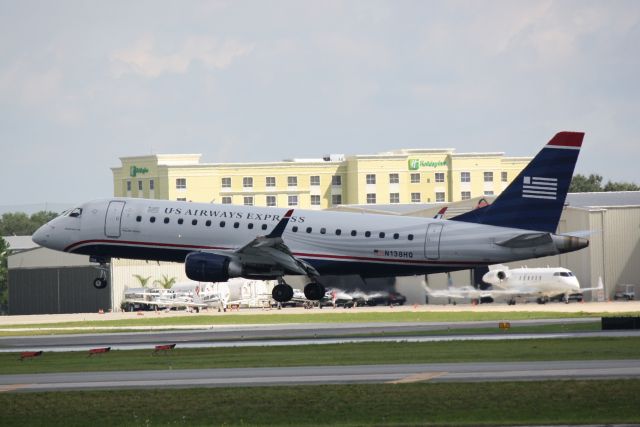 Embraer 170/175 (N133HQ) - US Air Flight 3215 operated by Republic (N133HQ) arrives at Sarasota-Bradenton International Airport following a flight from Charlotte-Douglas International Airport