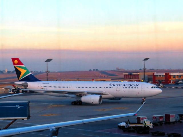 Airbus A330-200 (ZS-SXV) - Taken from inside the terminal