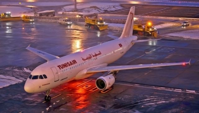 Airbus A320 (TS-IMD) - From Panoramic Terrace by night.Snow in ORY,4 Terminal.