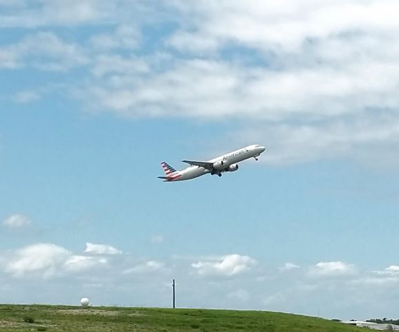 Airbus A321 — - Standing near the KMLB towers. The right from Runway 09R.