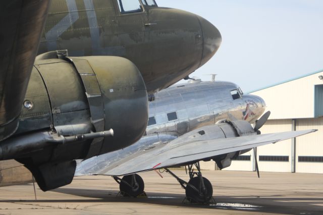 Douglas DC-3 (N47HL) - Oil "A Plenty" under starboard engine.