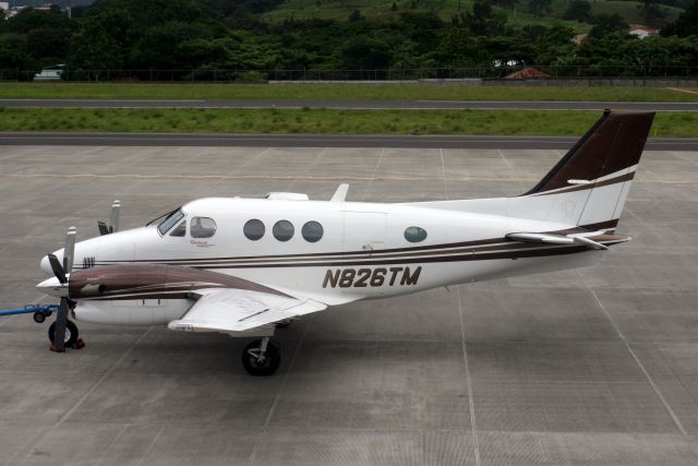 Beechcraft King Air 90 (N826TM) - About to be towed to the hangars on 25-Jul-13.