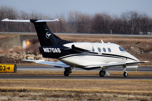 Embraer Phenom 100 (N670AS) - N670AS taxiing via Delta to Runway 23 at Buffalo (KBUF) before heading off to Cleveland (KBKL) as XSR670