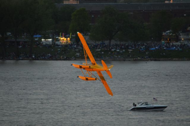 Piper L-21 Super Cub (N526CC) - (((My favorite shot)))  This dude was just living his best life and I could not stop snapping pics of that beautiful Cub and smiling. The sun was setting quickly allowing me to capture different light. Great performance by this Cub driver! Thunder Over Louisville 2024