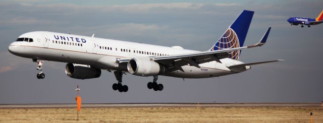 — — - Landing on 16L. Southwest 737 behind it is landing on 16R.