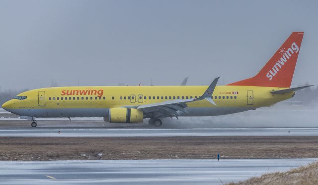 Boeing 737-800 (C-FJUB) - Sunwing 703 arrives home from Freeport, Bahamas much to the consternation of her passengers, Im sure!