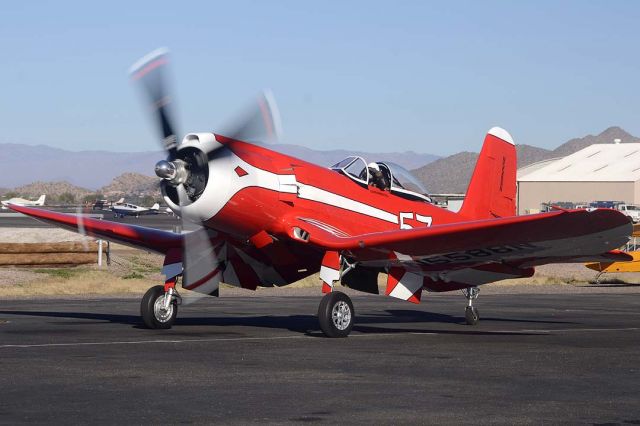 N5588N — - Larry Perkins taxis Race 57 to the Commemorative Air Force ramp.