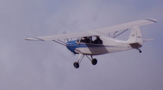 CHAMPION Tri-Traveler (N1885E) - This 1946 Aeronca 7AC Champion is making a low pass in the Autumn of 2024.