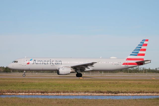 Airbus A321 (N173US) - American Flight 2555 taxis at Southwest Florida International Airport prior to flight to Charlotte-Douglas International Airport