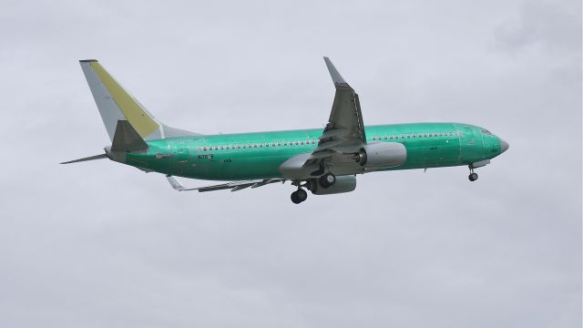 Boeing 737-800 (N1787B) - BOE728 (LN:4079) flies a missed approach to runway 16R during its maiden flight on 6/6/12. Permanent Tail # will be N895NN.