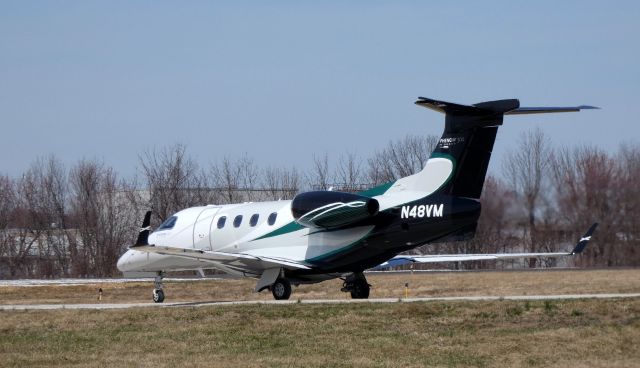 Embraer Phenom 300 (N48VM) - Taxiing to the active runway is this 2015 Embraer Executive Phenom EMB-505 in the Spring of 2019.
