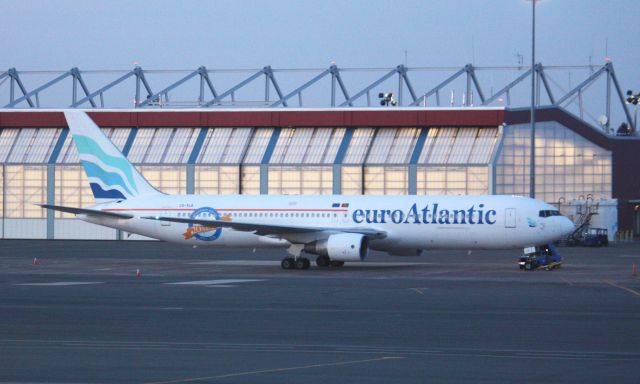 BOEING 767-300 (CS-TLO) - Euroatlantic B767-300 (CS-TLO) wearing 20 years 1993-2013 sticker at dusk.