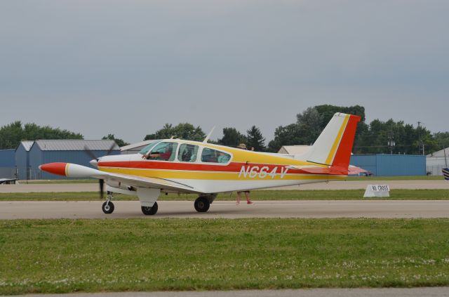 Beechcraft Bonanza (33) (N664V) - Bonanza Mass Arrival at Oshkosh AirVenture 2014.