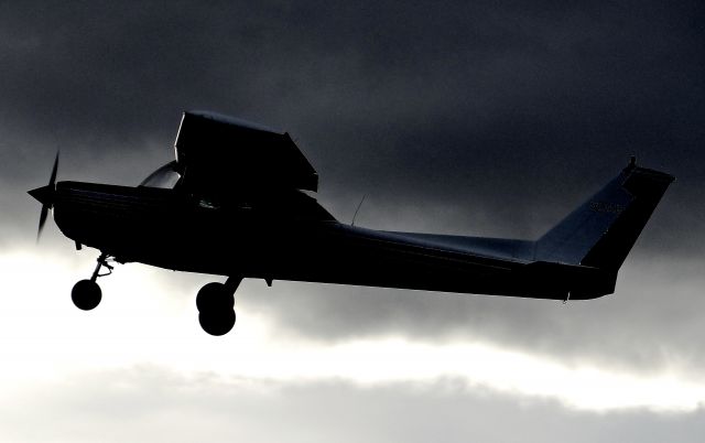 Cessna 152 (N5151B) - Locally-based Cessna 152 departing with a large storm approaching at Reid Hillview Airport.