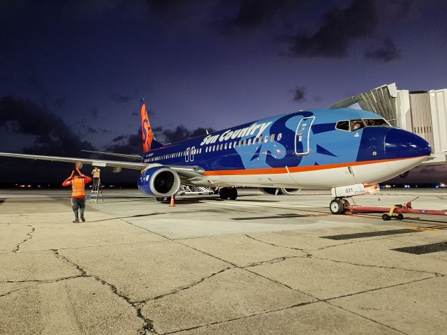 Boeing 737-800 (N821SY) - Parked at the gate, while fueling.