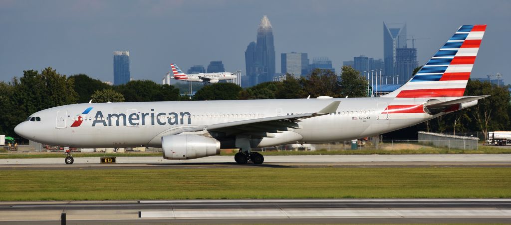 Airbus A330-200 (N282AY) - The golden hour starts to fall upon this taxiing A332.  From the CLT overlook, 9/22/18.