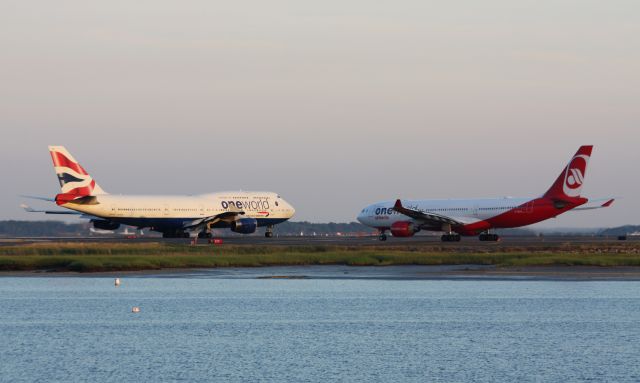 Airbus A330-200 (D-ABXA) - BA and Air Berlin One World liveries departing Boston Logan at sunset.