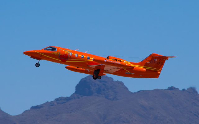 Learjet 35 (N312LG) - Departing from Henderson Executive Airport.