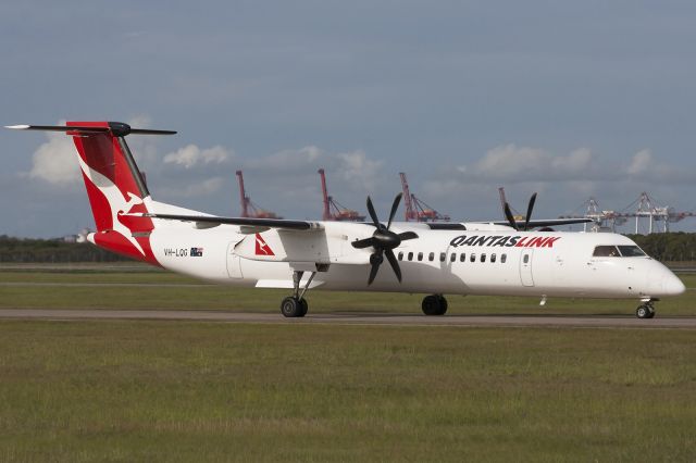 de Havilland Dash 8-400 (VH-LQG) - "Town of Exmouth" taxing along Bravo after arrivng from Emerald