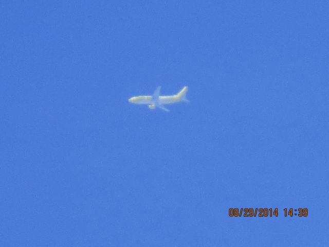 BOEING 737-300 (N334CS) - Wells Fargo Bank Northwest over Southeastern Kansas at 36k feet. Sorry for the bad picture but I have been following this jet for months and it always come just not close enough to get a picture and today finally it was somewhat close so had to post it. Ive worked hard for it...leave me alone. lol 