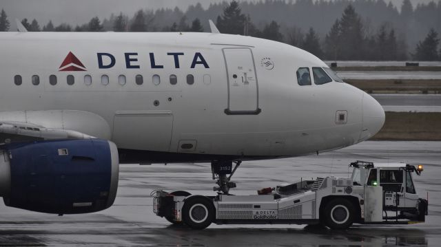 Airbus A319 (N352NB) - Delta Airbus A319-114 being towed across the ramp at SEATAC