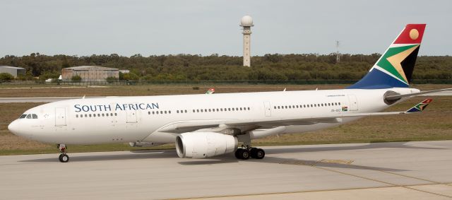 Airbus A330-200 (ZS-SXZ) - A very rare and unusual visitor to our very small local airport. This past weekend saw an influx of over 6000 athletes to our city (read : town) for the Iron Man Competition. On Tuesday 4 September our National Carrier had to replace the usual 11:00 am flight (SA405) of either an A319 or A320, with this wide-body A330-243. Not only for the large number of International athletes heading back to Johannesburg, but also for the Cargo. Besides the usual "baggage", there were also a few hundred bicycles that needed to be loaded up. Flight SA405 (SA410 return) operated the A332 on both Tues & Wed to accommodate all the extra passengers and their unusual cargo.  With a runway length of less than 6,700 foot it becomes a tight fit for this big bird. The apron is too narrow to park "normally" and therefore she had to park at an angle. Being at sea level, and with a typical wind blowing, besides the parking space, our little airport can handle it. The last time a aircraft of comparable size visited our airport was in 2010 for the Soccer World Cup.