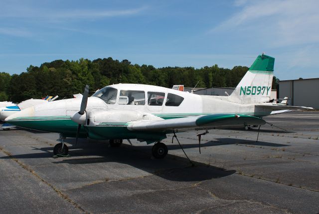 Piper Aztec (N5097Y) - 1962 Piper PA-23-250 Aztec severely in need of a repaint. Photo taken on 05/22/2021.