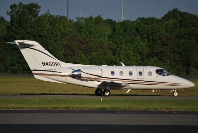 Beechcraft Beechjet (N400RY) - ROBERT YATES RACING INC taxiing at KJQF - 5/6/12