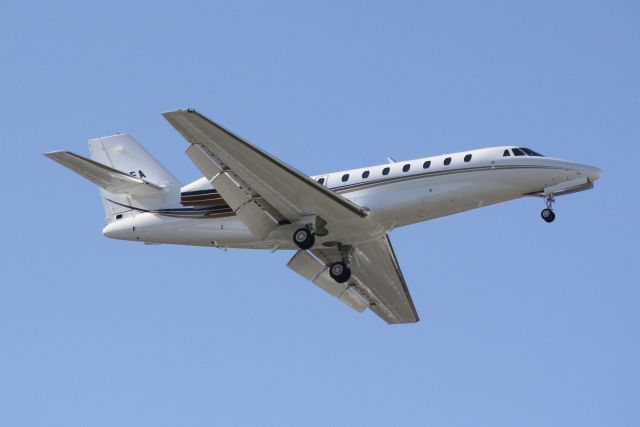 Cessna Citation Sovereign (N81EA) - Cessna Citation Sovereign (N81EA) on approach to Sarasota-Bradenton International Airport following a flight from Austin Staubel International Airport