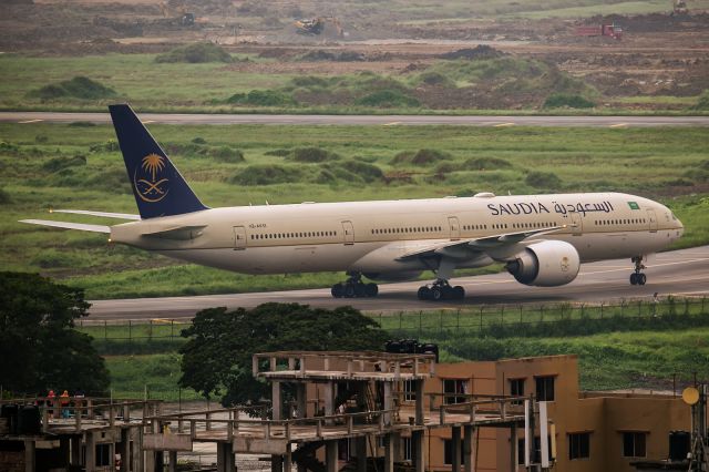 BOEING 777-300 (HZ-AK33) - 18th Oct., 2020: Taxiing to the ramp from Sierra via Charlie at Dhaka's Zia International Airport which is currently undergoing a major upgrade including the construction of a third terminal. (See http://www.planexplorer.net/Xploregallery/displayimage.php?pid=1700 )