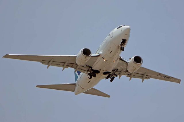 BOEING 737-600 (C-GWSI) - WestJet 737-6CT C-GWSI retracting its landing gear as it is waved off from its approach to Runway 8 at Phoenix Sky Harbor on April 26, 2018.