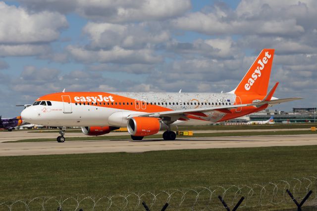 Airbus A320 (G-EZOX) - Easyjets 20th anniversary plane lining up for the short flight to Belfast.